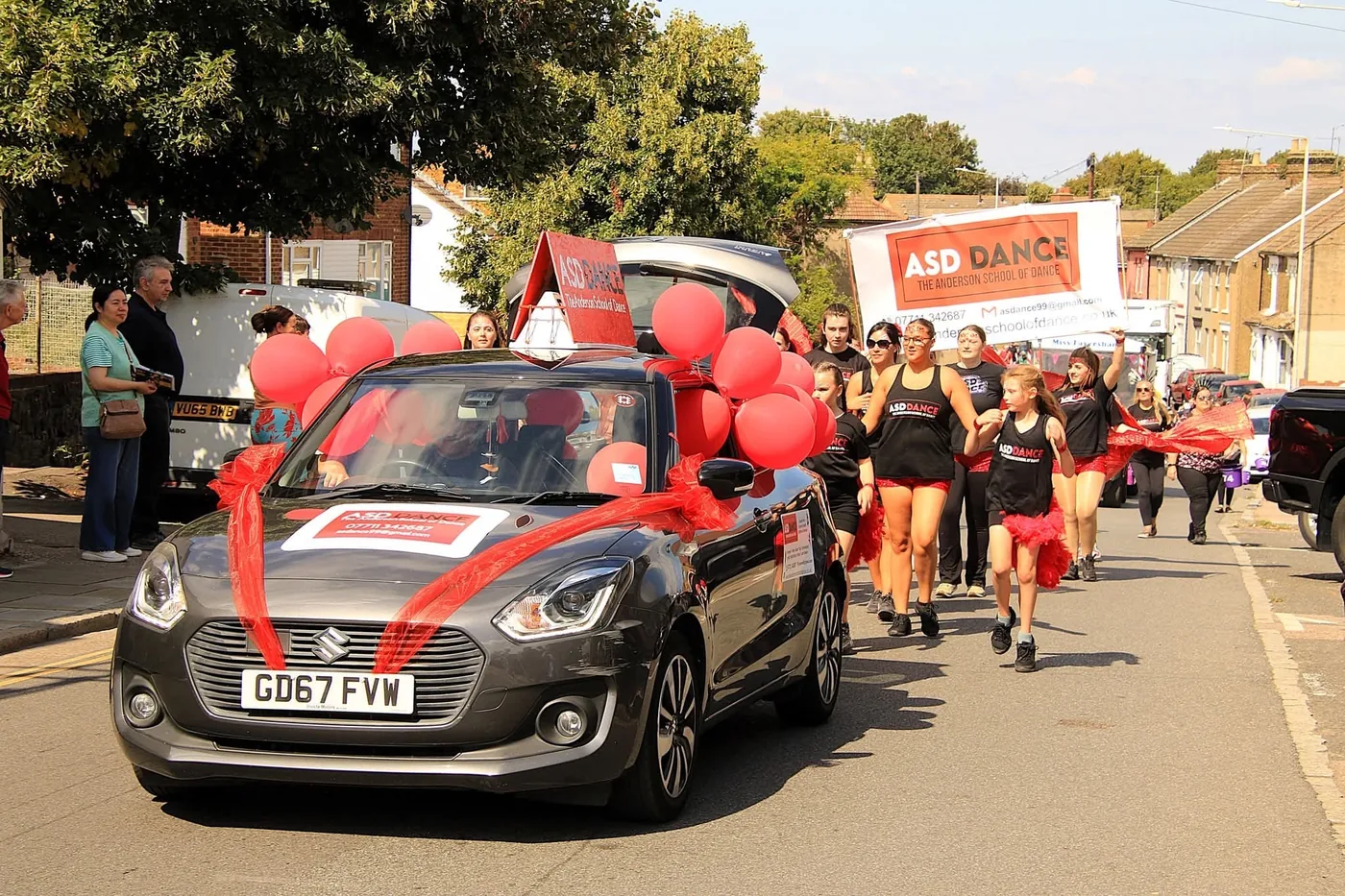 ASD Dance in a carnival parade through Medway