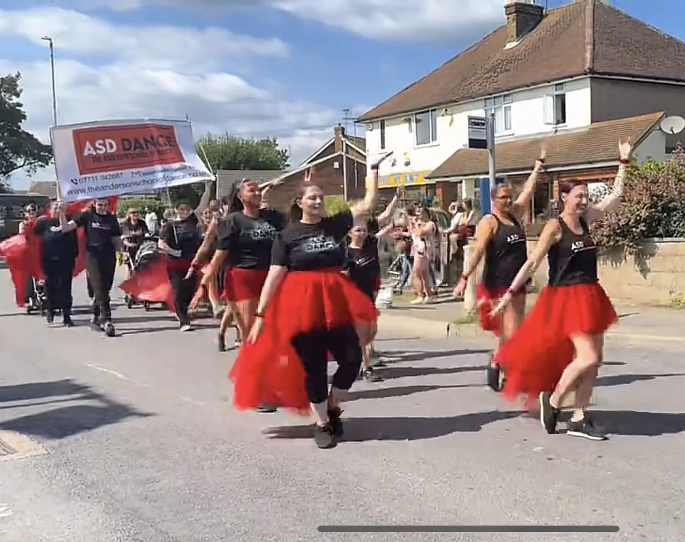 ASD Dance performing through the streets